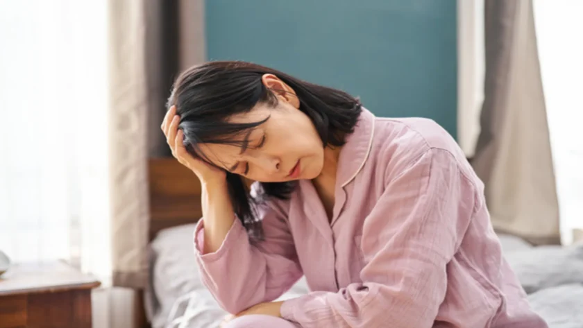 体調不良の中年女性