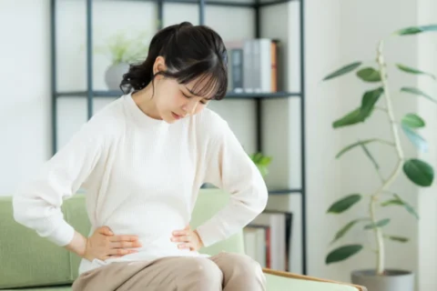 生理痛がつらい女性